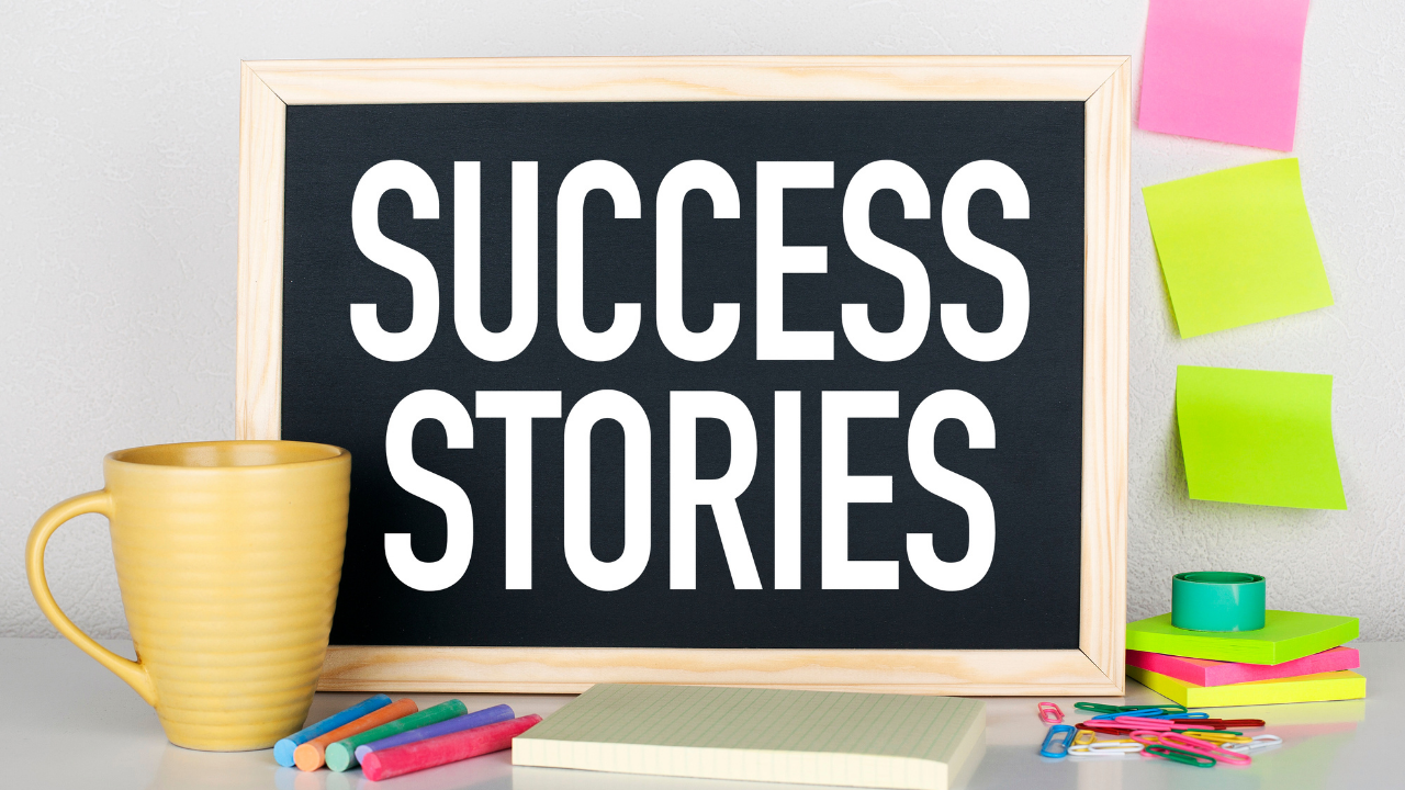 SUCCESS STORIESと書かれたボード